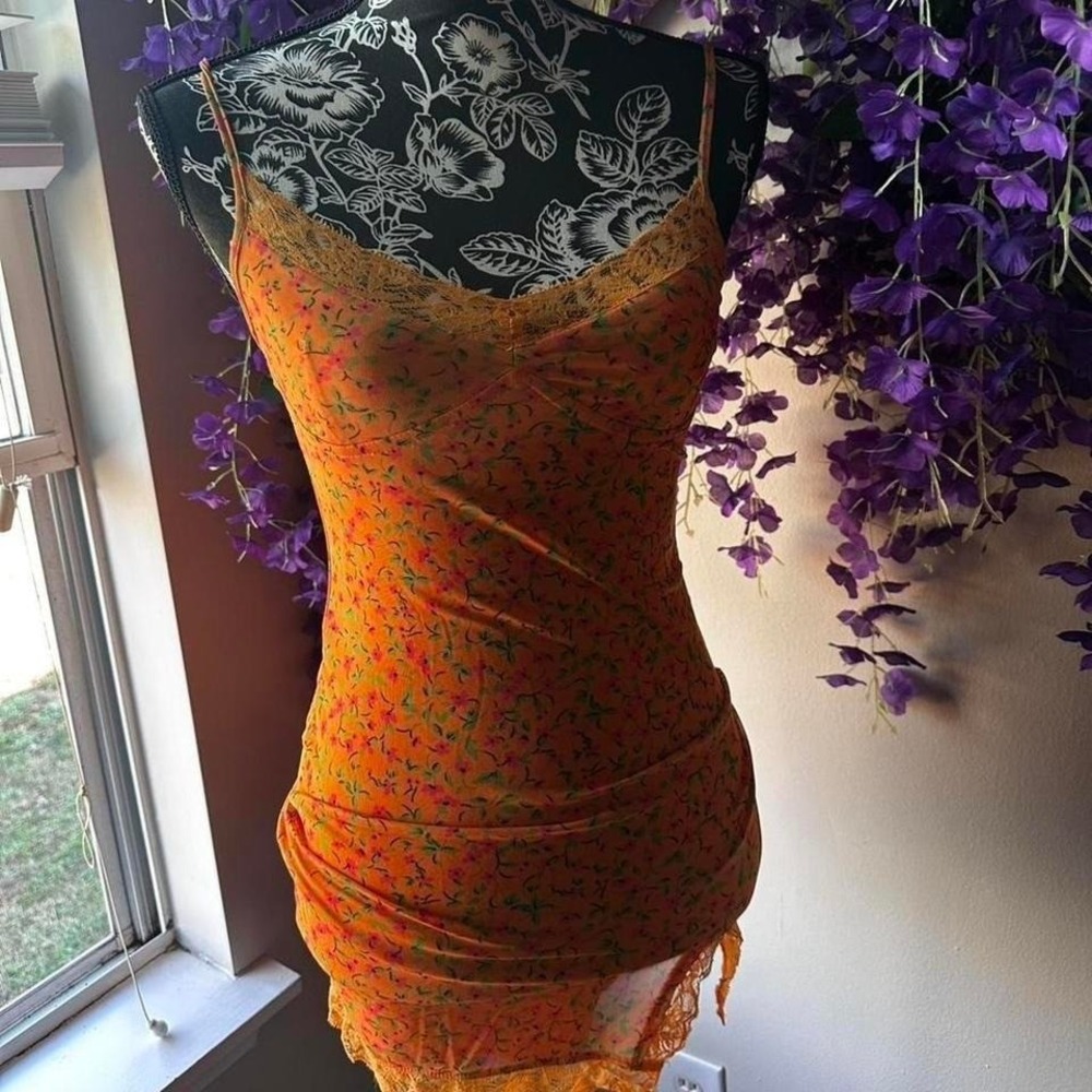 Orange floral slip dress by Motel with pink and green print